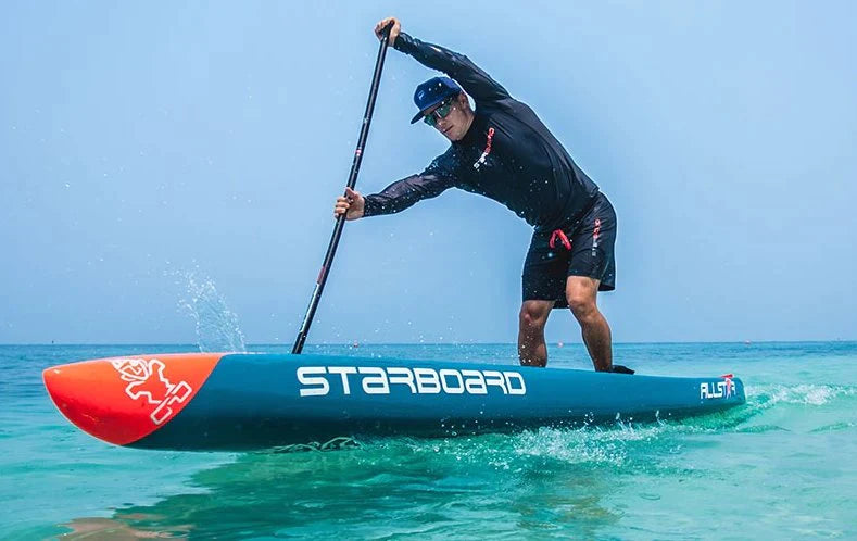 Paddler racing on an allstar dugout