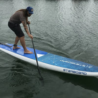 paddler on starboard generation SUP paddle board