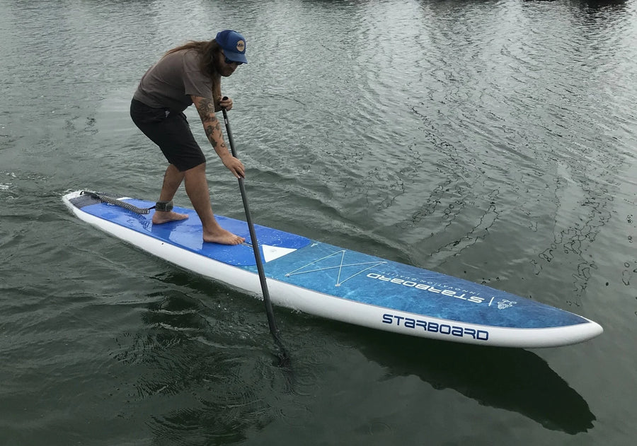 paddler on starboard generation SUP paddle board